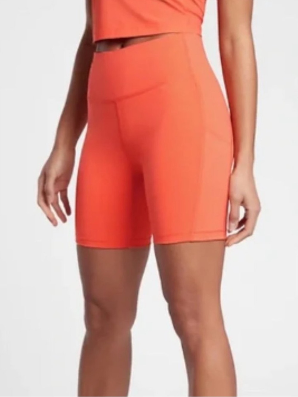 athleta ultimate stash pocket 7" short orange XS